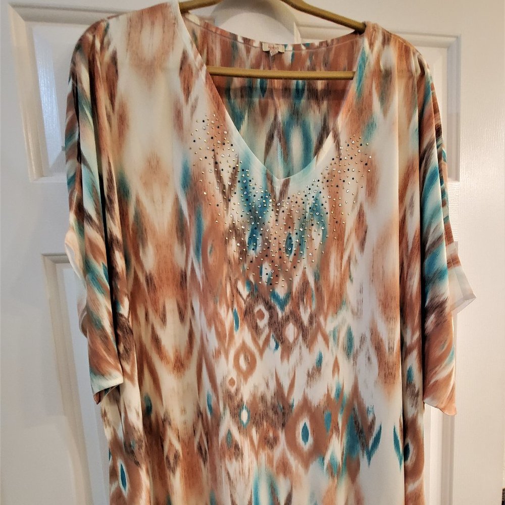 Designer tunic with fringe
